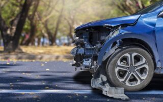 Where Do Most Car Accidents Happen Mississippi Gulf Coast portrayed by blue car after an accident.